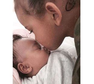 Kim-Kardashian's-Son-Saint-Kissing-Daughter-Chicago-2-tsb.com.ng