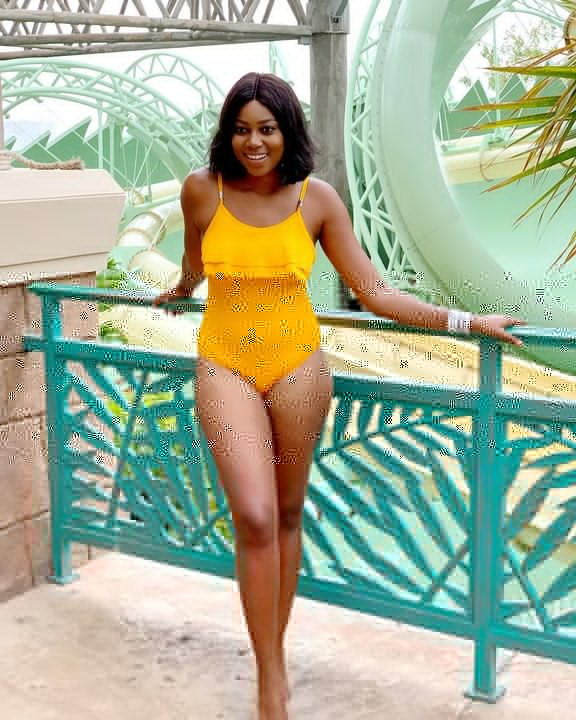 Yvonne Nelson Stuns In Yellow Swimsuit tsb.com .ng