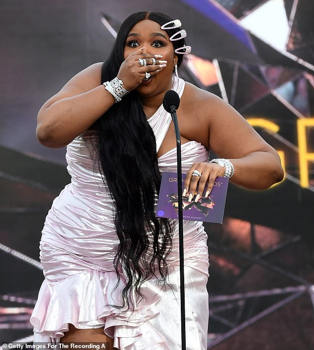 Lizzo Looks Shocked As She Accidentally Curses While Presenting Best ...