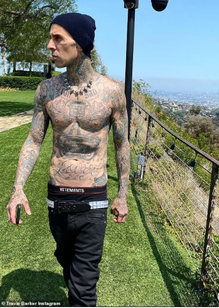 Travis Barker shares a shirtless snap on Instagram... after sparking