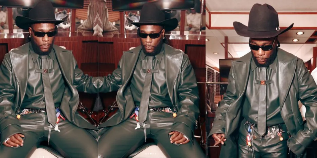 Reactions as Burna Boy shares new pictures with padlocks following Grammy Award loss